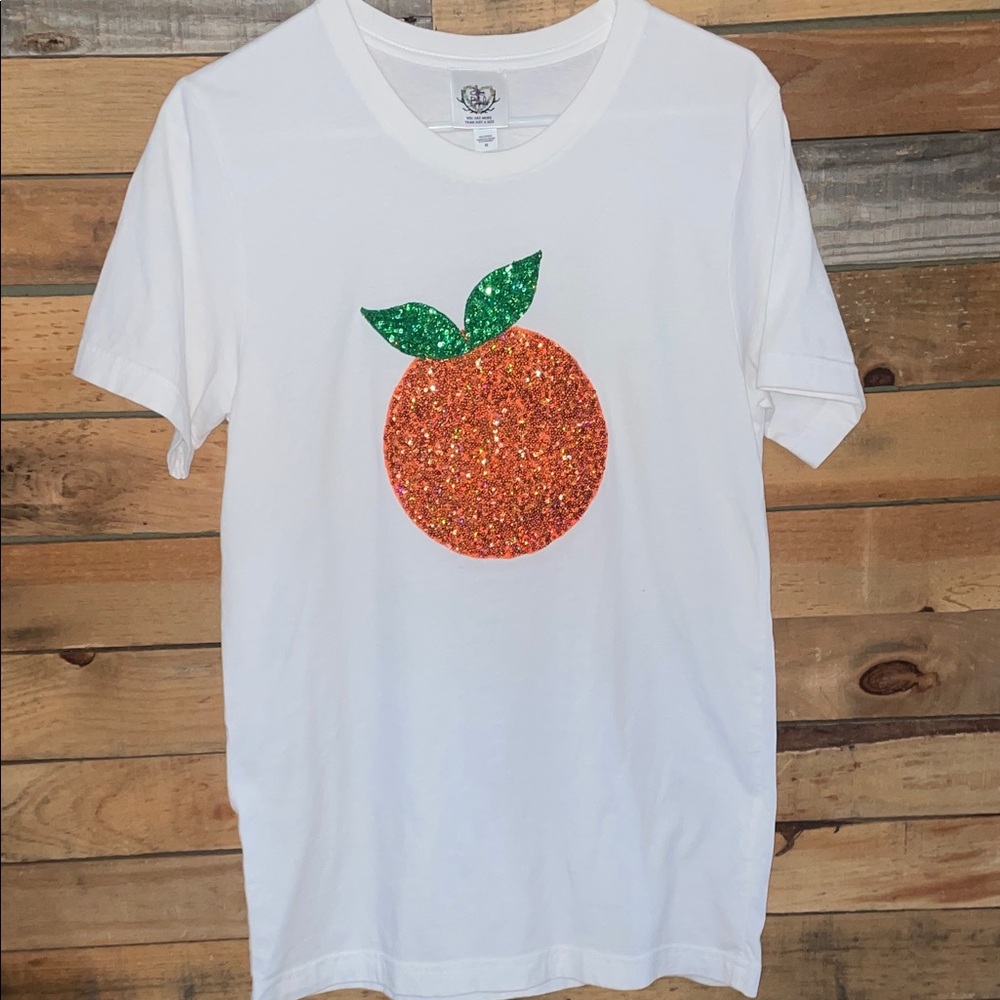 White T-Shirt with Orange Glitter Design